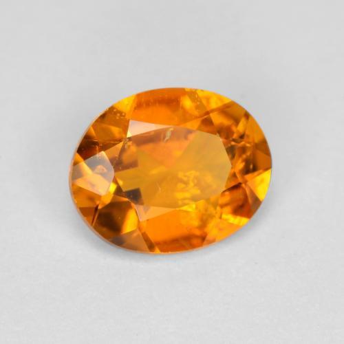 0.54캐럿 천연 살구 오렌지 클리노휴마이트, 타원형 컷, 6.1×4.9 mm, SI