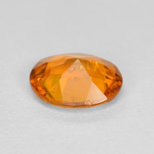 0.54캐럿 천연 살구 오렌지 클리노휴마이트, 타원형 컷, 6.1×4.9 mm, SI