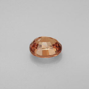 1.47캐럿 천연 골든 브라운에서 오렌지 컬러체인지 가넷, 타원형 컷, 6.9×5.9 mm, VVS-VS
