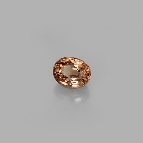 0.85캐럿 천연 골든 브라운에서 핑크 컬러체인지 가넷, 타원형 컷, 5.6×4.4 mm, VS
