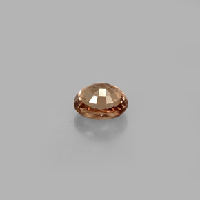 0.85캐럿 천연 골든 브라운에서 핑크 컬러체인지 가넷, 타원형 컷, 5.6×4.4 mm, VS