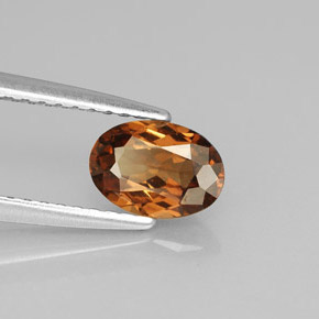 0.91캐럿 천연 오렌지 컬러체인지 가넷, 타원형 컷, 7×4.9 mm, VS