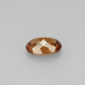 0.91캐럿 천연 오렌지 컬러체인지 가넷, 타원형 컷, 7×4.9 mm, VS