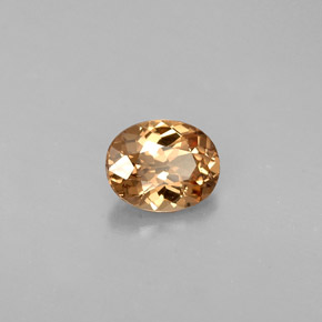 0.64캐럿 천연 골든 브라운에서 오렌지 컬러체인지 가넷, 타원형 컷, 5.8×4.6 mm, VVS-VS