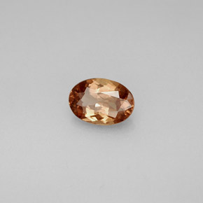 1.00캐럿 천연 골든 브라운에서 오렌지 컬러체인지 가넷, 타원형 컷, 7.1×5 mm, VS