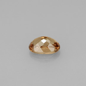 0.66캐럿 천연 골든 브라운에서 오렌지 컬러체인지 가넷, 타원형 컷, 6×4 mm, VVS-VS