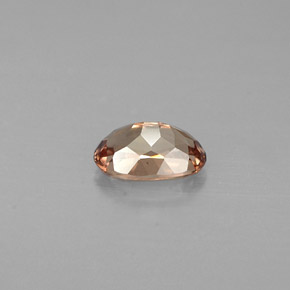 0.61캐럿 천연 갈색빛 로즈에서 레드 컬러체인지 가넷, 타원형 컷, 6.1×4 mm, VVS-VS