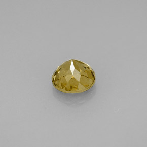 0.96캐럿 천연 골든 브라운에서 오렌지 컬러체인지 가넷, 라운드 컷, 5.60 mm, VS