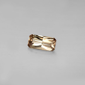0.60캐럿 천연 골든 브라운에서 핑크 컬러체인지 가넷, 에메랄드 컷, 7×3.5 mm, VS
