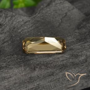0.63캐럿 천연 골든 브라운 컬러체인지 가넷, 에메랄드 컷, 7×3.6 mm, VVS-VS