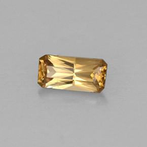 0.68캐럿 천연 골든 브라운에서 오렌지 컬러체인지 가넷, 에메랄드 컷, 7×3.5 mm, VVS-VS