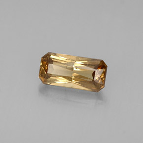 0.73캐럿 천연 골든 브라운에서 오렌지 컬러체인지 가넷, 에메랄드 컷, 7×3.4 mm, VVS-VS