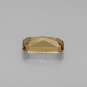 0.73캐럿 천연 골든 브라운에서 오렌지 컬러체인지 가넷, 에메랄드 컷, 7×3.4 mm, VVS-VS