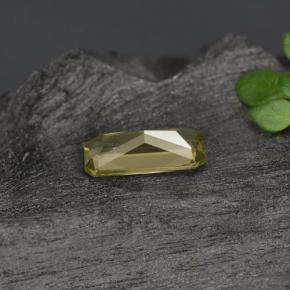 0.59캐럿 천연 골든 브라운 컬러체인지 가넷, 에메랄드 컷, 7×3.4 mm, VS