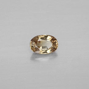 0.69캐럿 천연 골든 브라운 컬러체인지 가넷, 타원형 컷, 6×4.1 mm, VVS-VS
