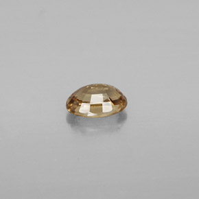 0.69캐럿 천연 골든 브라운 컬러체인지 가넷, 타원형 컷, 6×4.1 mm, VVS-VS