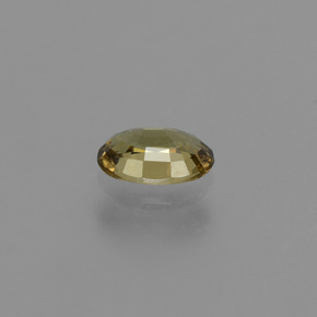 0.64캐럿 천연 녹갈색에서 레드핑크 컬러체인지 가넷, 타원형 컷, 6.2×4.1 mm, VVS-VS