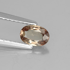 0.57캐럿 천연 갈색빛 로즈에서 레드 컬러체인지 가넷, 타원형 컷, 6×4.1 mm, VVS