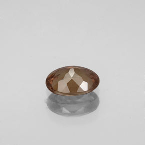 1.00캐럿 천연 녹갈색에서 오렌지 컬러체인지 가넷, 타원형 컷, 7×5.1 mm, VS-SI
