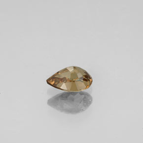 0.57캐럿 천연 골든 브라운에서 오렌지 컬러체인지 가넷, 배 모양, 6.1×4.2 mm, VS