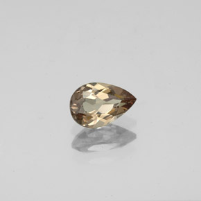 0.73캐럿 천연 골든 브라운에서 오렌지 컬러체인지 가넷, 배 모양, 6.8×4.5 mm, VS