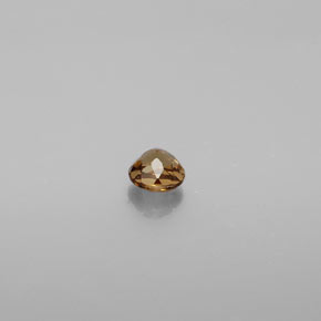 0.43캐럿 천연 골든 브라운에서 오렌지 컬러체인지 가넷, 라운드 컷, 4.13 mm, VS