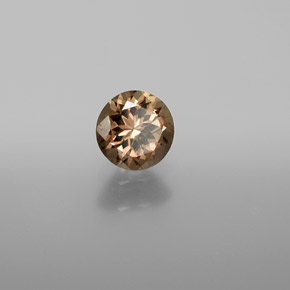 1.10캐럿 천연 골든 브라운에서 오렌지 컬러체인지 가넷, 라운드 컷, 6.02 mm, VS