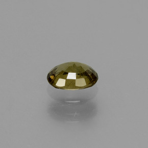 0.62캐럿 천연 골든 옐로우 컬러체인지 가넷, 타원형 컷, 5.7×4.4 mm, VS