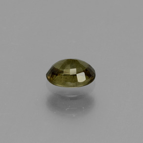0.61캐럿 천연 녹갈색에서 레드핑크 컬러체인지 가넷, 타원형 컷, 5.6×4.1 mm, VS