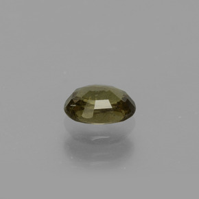0.69캐럿 천연 골든 옐로우 컬러체인지 가넷, 타원형 컷, 5.9×4.3 mm, VS