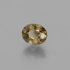 0.81캐럿 천연 다크 브라운 컬러체인지 가넷, 타원형 컷, 5.7×4.6 mm, VS