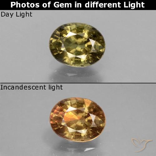 0.92캐럿 천연 녹빛 골든 브라운 컬러체인지 가넷, 타원형 컷, 6.4×5.1 mm, VS-SI