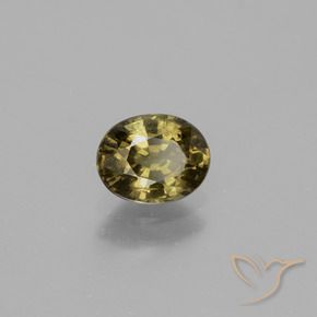 0.92캐럿 천연 녹빛 골든 브라운 컬러체인지 가넷, 타원형 컷, 6.4×5.1 mm, VS-SI