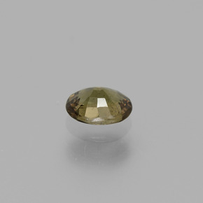 0.77캐럿 천연 미디엄 다크 브라운 컬러체인지 가넷, 타원형 컷, 6.1×4.7 mm, VS