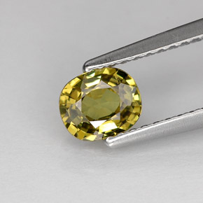 0.62캐럿 천연 골든 그린 데만토이드 가넷, 타원형 컷, 5.7×4.8 mm, VS