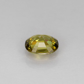 0.62캐럿 천연 골든 그린 데만토이드 가넷, 타원형 컷, 5.7×4.8 mm, VS