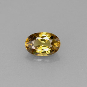 0.63캐럿 천연 녹빛 골든 데만토이드 가넷, 타원형 컷, 6.1×4.2 mm, VS