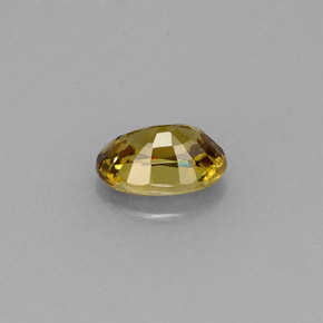 0.63캐럿 천연 녹빛 골든 데만토이드 가넷, 타원형 컷, 6.1×4.2 mm, VS