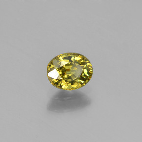 0.58캐럿 천연 골든 그린 데만토이드 가넷, 타원형 컷, 5.4×4.4 mm, VS