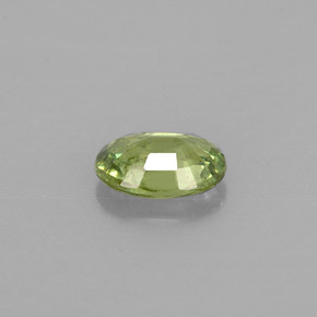 0.54캐럿 천연 골든 그린 데만토이드 가넷, 타원형 컷, 6×4.3 mm, VS-SI