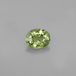 0.66캐럿 천연 골든 그린 데만토이드 가넷, 타원형 컷, 5.8×4.6 mm, VS-SI