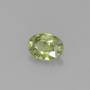 0.33캐럿 천연 골든 그린 데만토이드 가넷, 타원형 컷, 4.9×3.6 mm, VS-SI