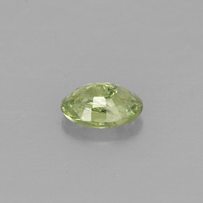 0.33캐럿 천연 골든 그린 데만토이드 가넷, 타원형 컷, 4.9×3.6 mm, VS-SI