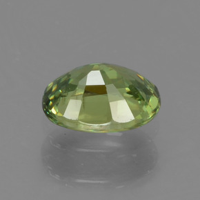 0.54캐럿 천연 미디엄 그린 데만토이드 가넷, 타원형 컷, 5.6×4.1 mm, VS