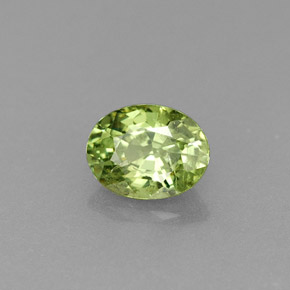 0.54캐럿 천연 골든 그린 데만토이드 가넷, 타원형 컷, 5.4×4.2 mm, VS-SI