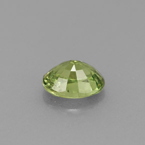 0.54캐럿 천연 골든 그린 데만토이드 가넷, 타원형 컷, 5.4×4.2 mm, VS-SI