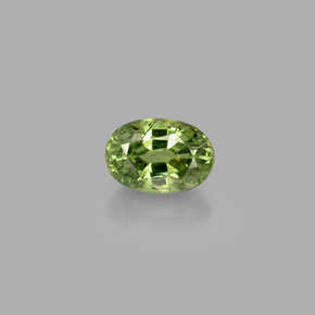 0.72캐럿 천연 골든 그린 데만토이드 가넷, 타원형 컷, 5.9×4.1 mm, VS