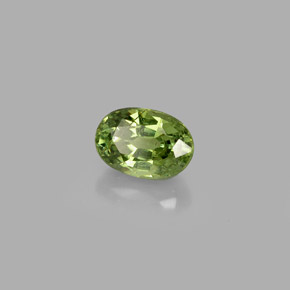 0.72캐럿 천연 골든 그린 데만토이드 가넷, 타원형 컷, 5.9×4.1 mm, VS