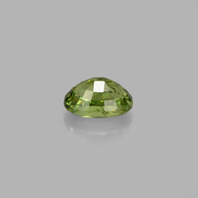 0.72캐럿 천연 골든 그린 데만토이드 가넷, 타원형 컷, 5.9×4.1 mm, VS