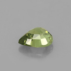0.66캐럿 천연 골든 그린 데만토이드 가넷, 배 모양, 5.9×4.8 mm, VS